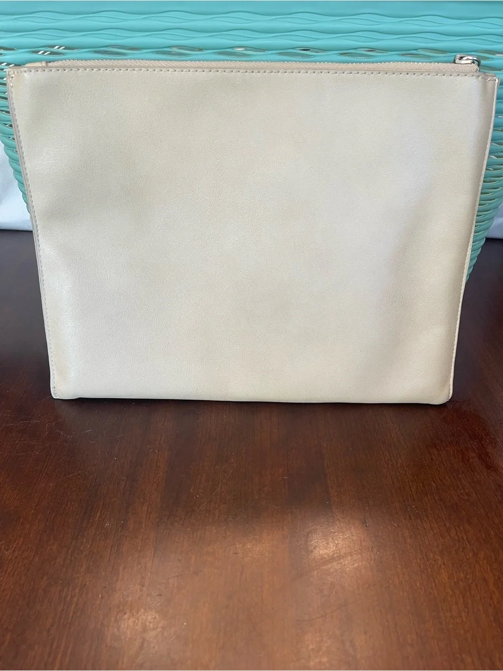 New Directions perforated clutch bag Tan